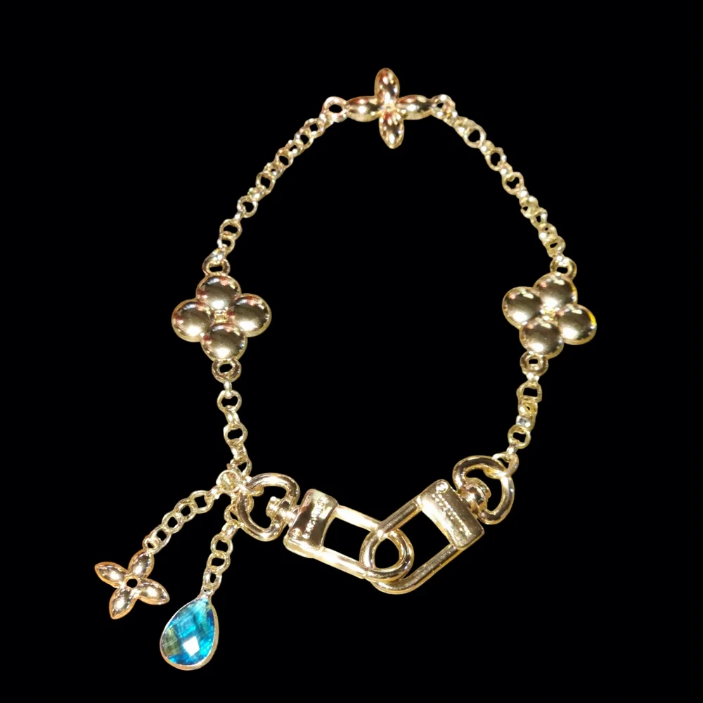 Elegant Gold Bag Chain/Charm with Blue Accent